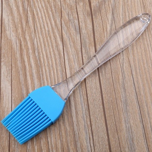 Silicone oil brush with plastic handle